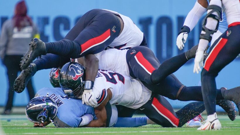 Danielle Hunter and the Texans defense sack Cam Ward.