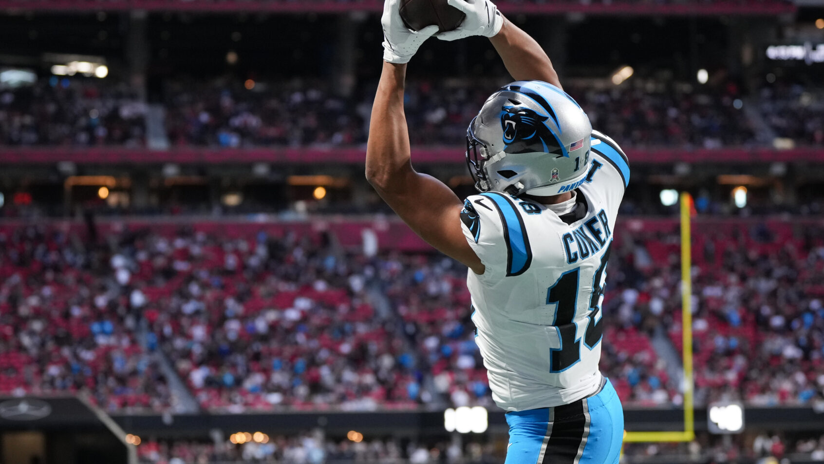 Jalen Coker catching the ball