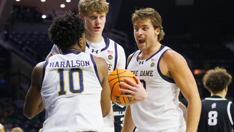 Notre Dame forward Carson Towt celebrates after an and-one