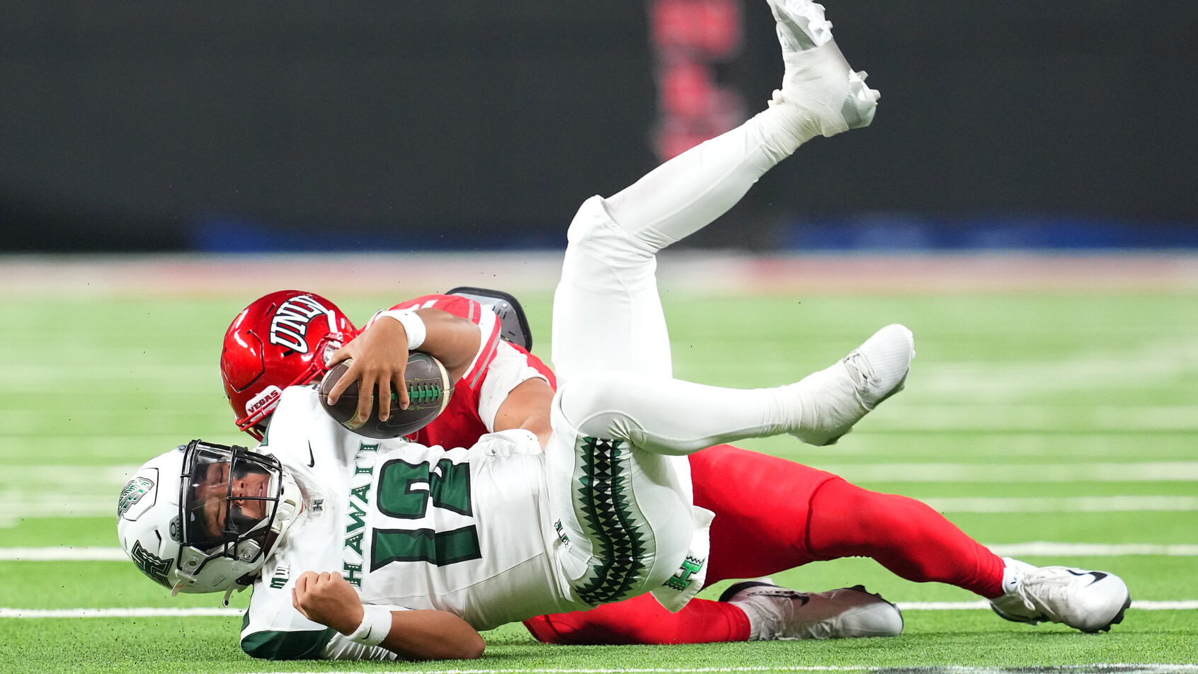 Micah Alejado getting tackled