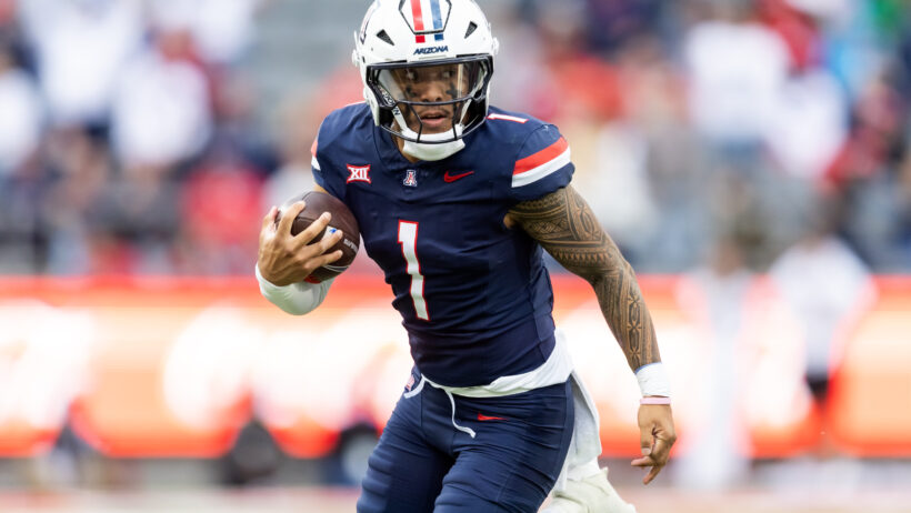 Noah Fifita scrambles versus Baylor.