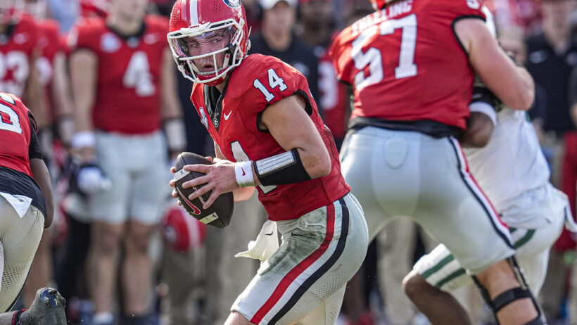 Gunner Stockton takes a snap versus Charlotte in Week 13.