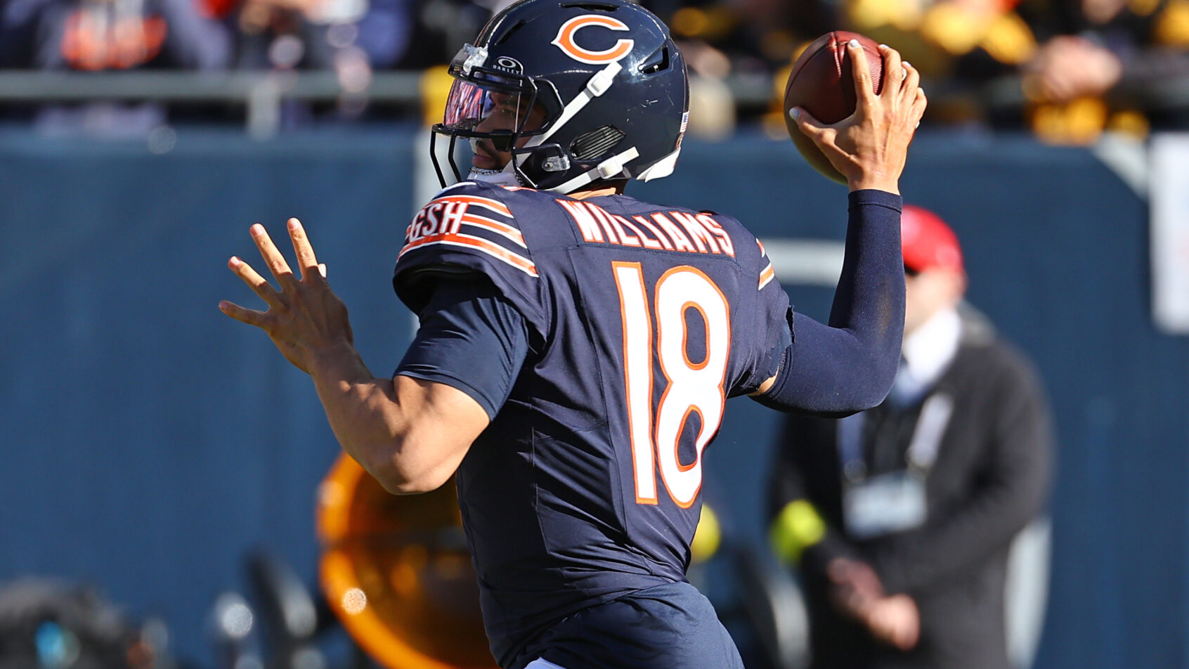 Chicago Bears quarterback Caleb Williams throwing a pass