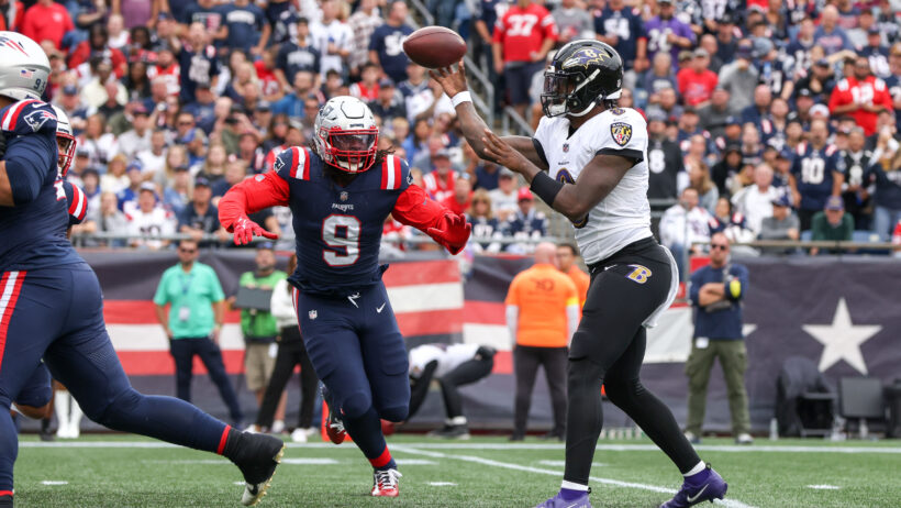 Baltimore Ravens quarterback Lamar Jackson throwing a pass
