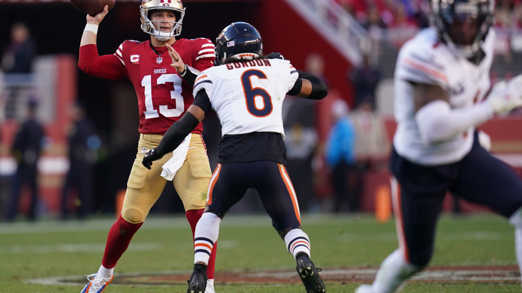 San Francisco 49ers quarterback Brock Purdy throwing a pass against the Chicago Bears