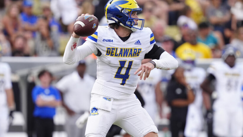 Delaware QB Nick Minicucci drops back to pass.