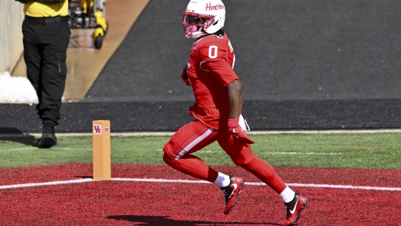 Amare Thomas scores a touchdown versus Arizona.