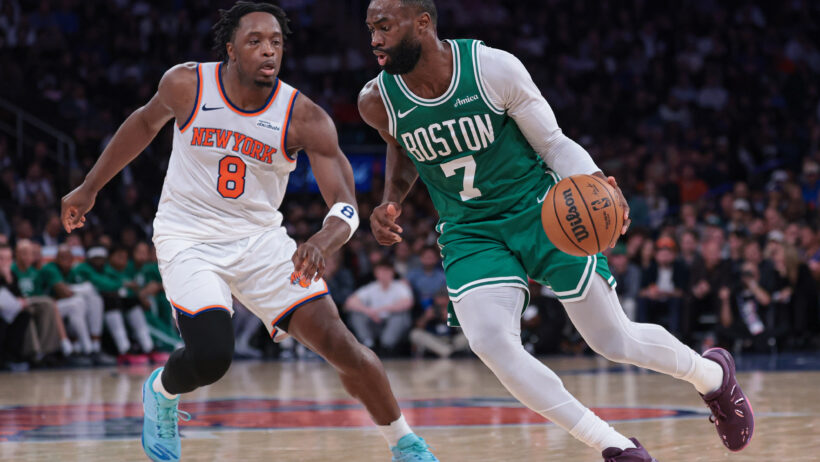 Boston Celtics guard Jaylen Brown drives as New York Knicks forward OG Anunoby defends