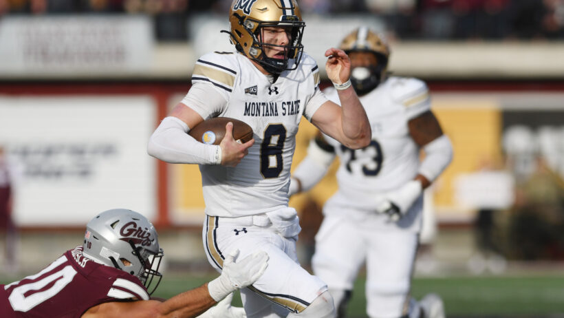 Justin Lamson rushes for a touchdown against Montana.
