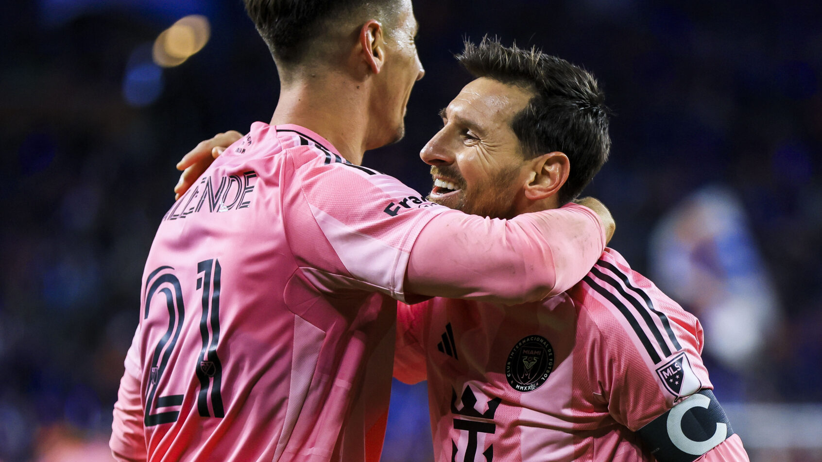 Lionel Messi celebrates an Inter Miami goal with teammate Tadeo Allende.