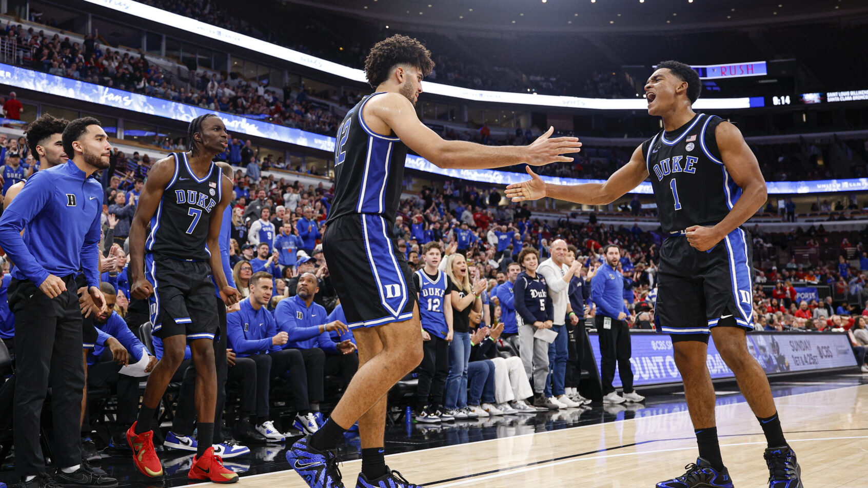 Duke Blue Devils forward Cameron Boozer and guard Caleb Foster high-five