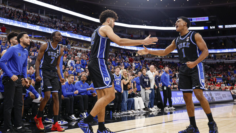 Duke Blue Devils forward Cameron Boozer and guard Caleb Foster high-five
