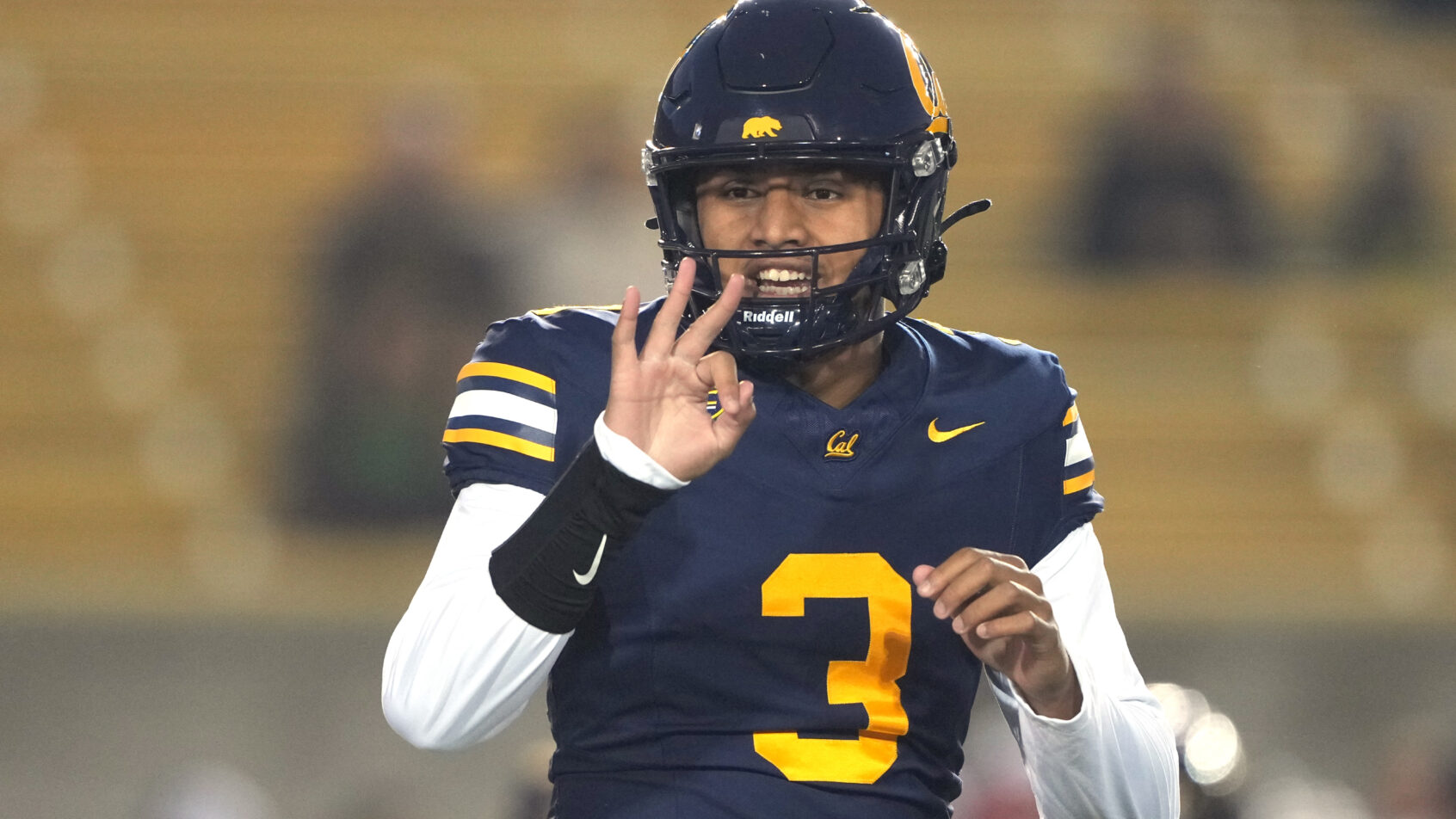 Jaron-Keawe Sagapolutele holds up three fingers