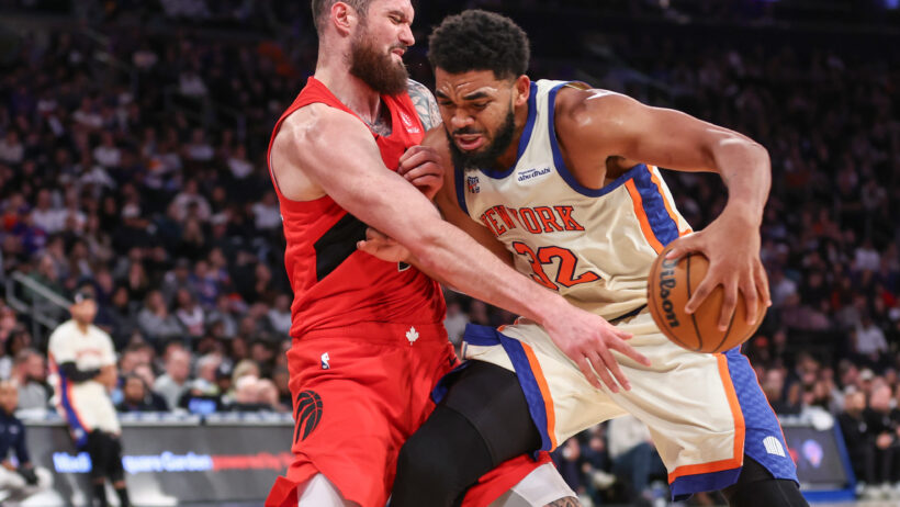 New York Knicks center Karl-Anthony Towns bulldozes into Toronto Raptors forward Sandro Mamukelashvili
