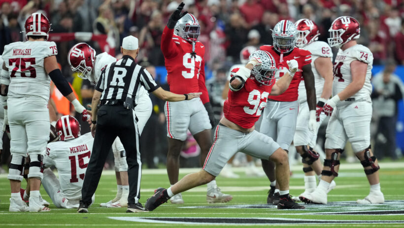 Ohio State's Caden Curry celebrates a Buckeyes stop versus Indiana.