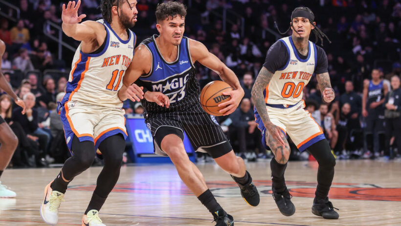 Orlando Magic forward Tristan da Silva puts a shoulder into New York Knicks guard Jalen Brunson