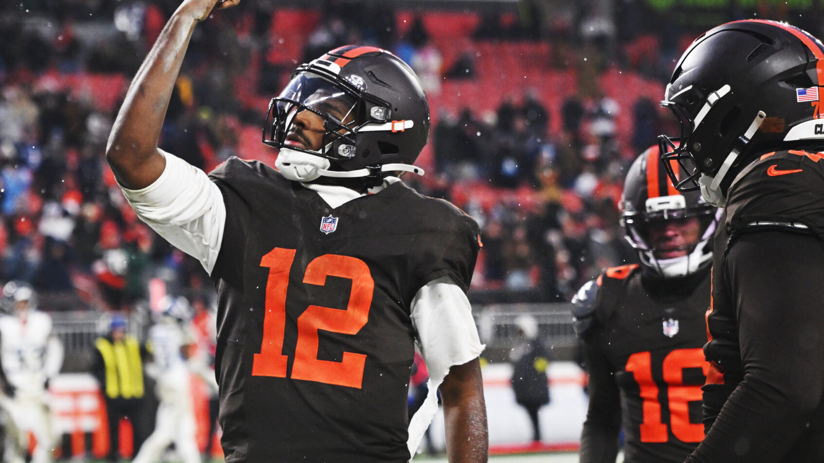 Shedeur Sanders celebrating after scoring a touchdown