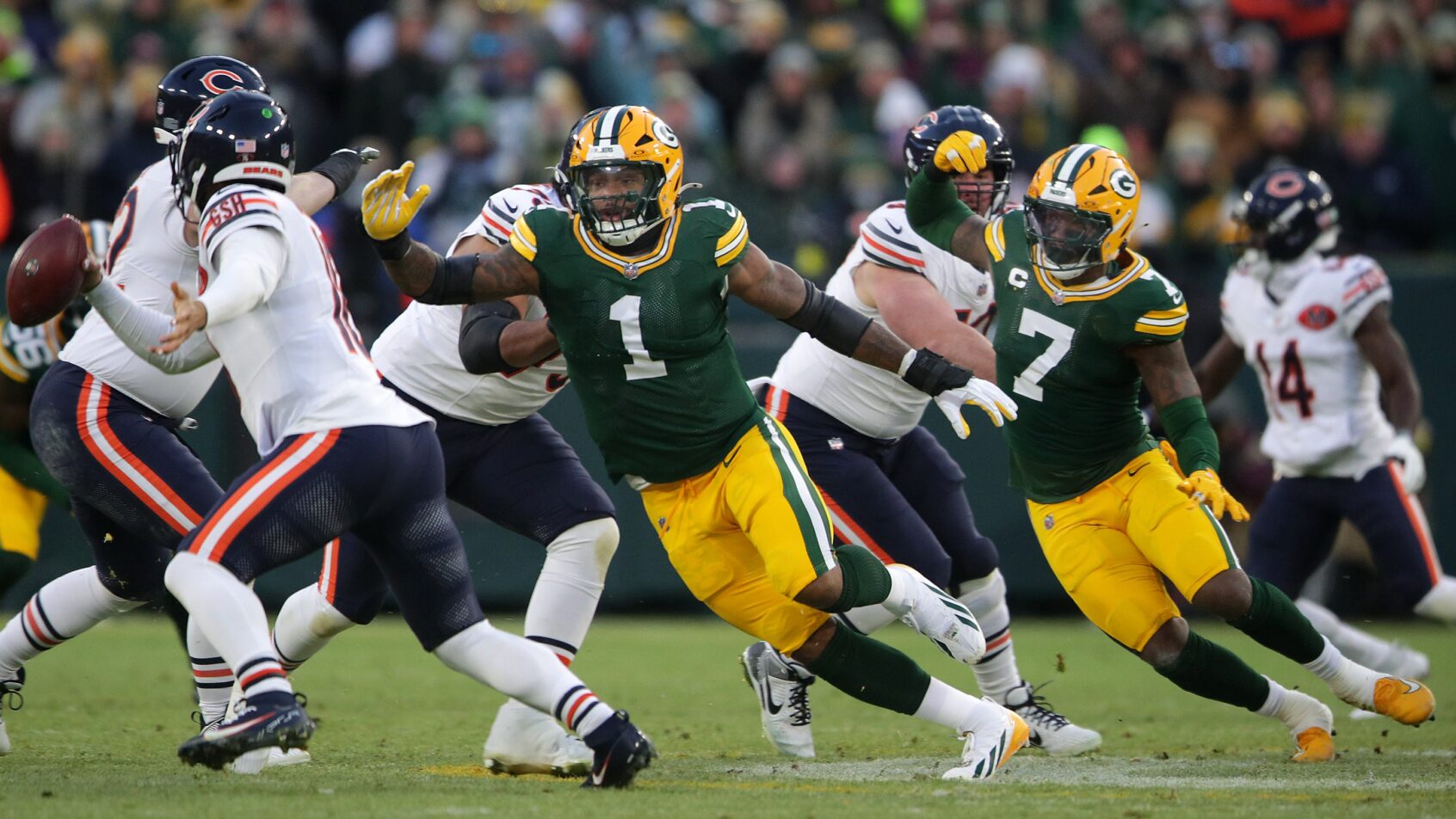 Green Bay Packers defensive end Micah Parsons chases Chicago Bears quarterback Caleb Williams
