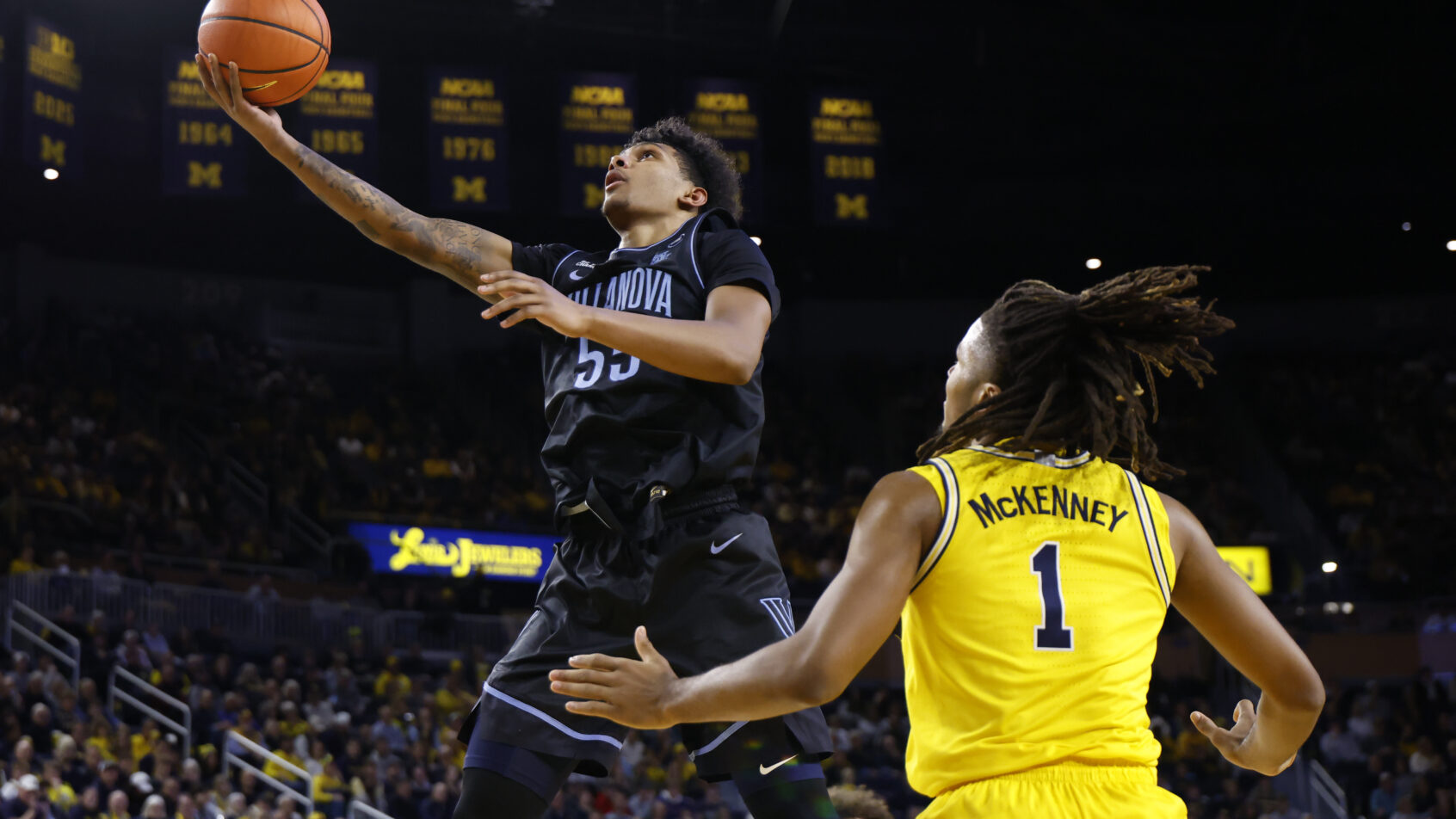Villanova Wildcats guard Acaden Lewis jumps for layup.