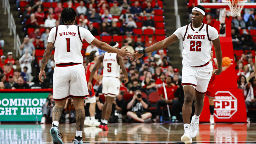 Darrion Williams and Ven-Allen Lubin high five each other