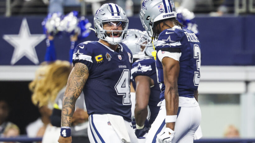 Dak Prescott celebrates a TD with George Pickens.