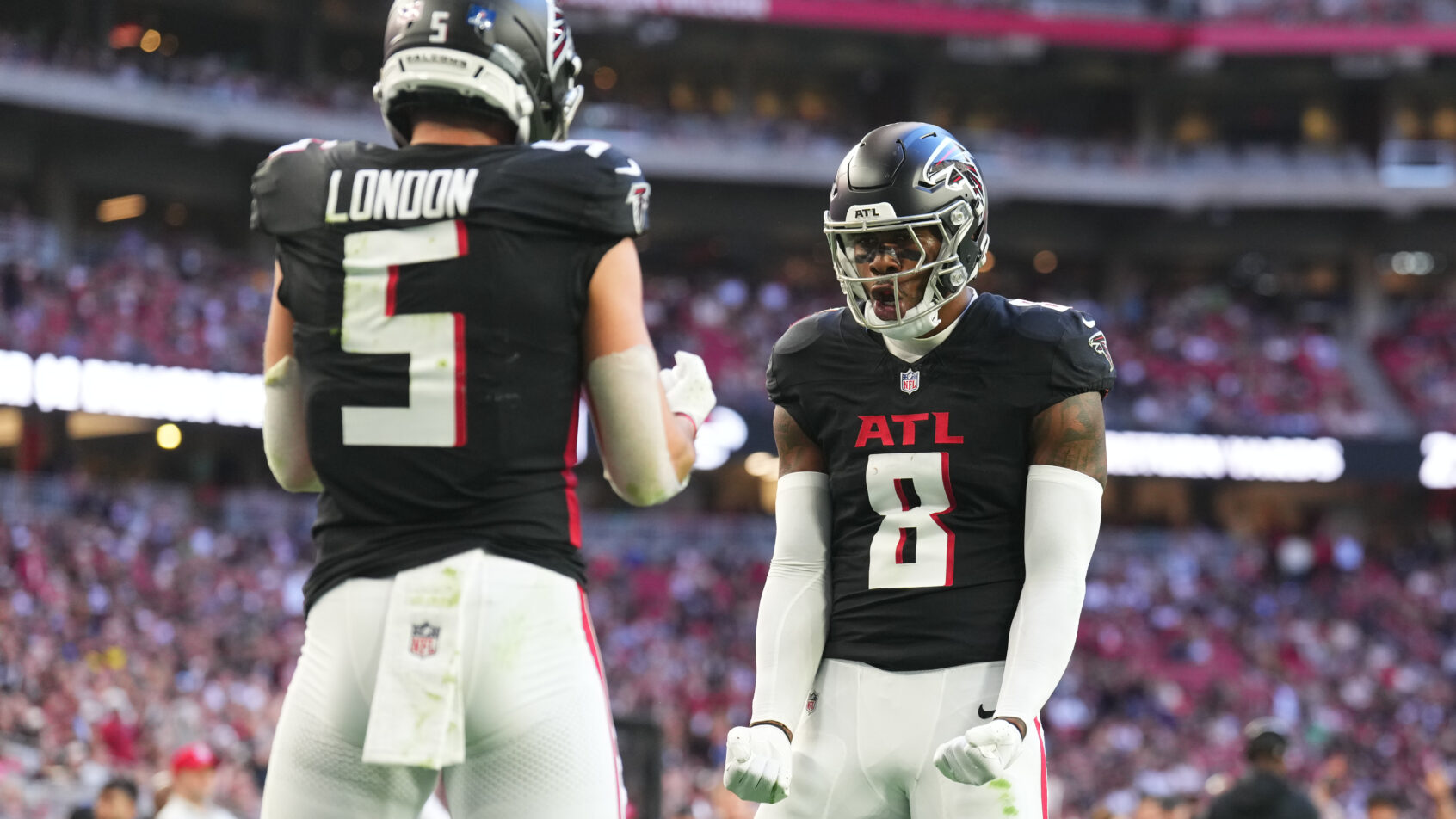 Drake London and Kyle Pitts celebrating in the endzone