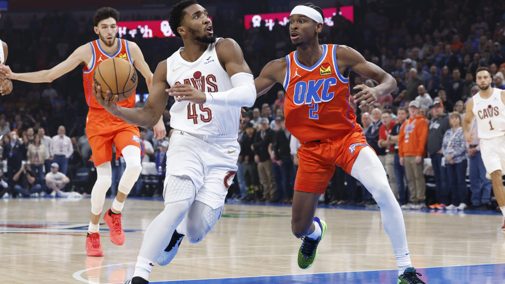 Donovan Mitchell takes on Shai Gilgeous-Alexander.
