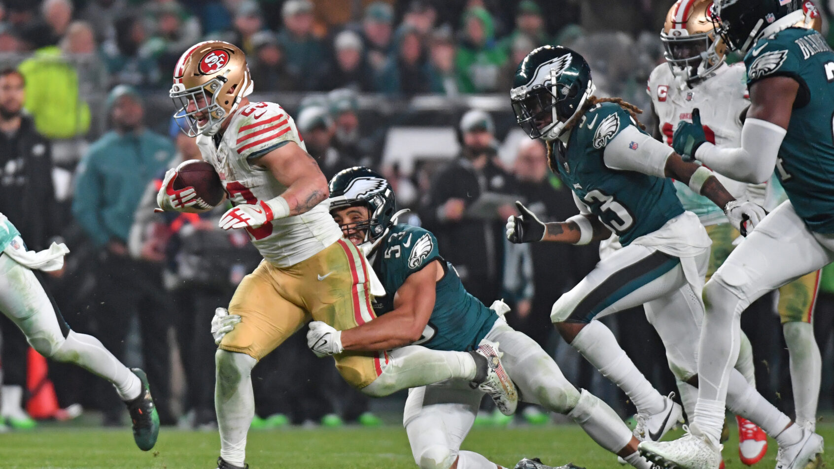 San Francisco 49ers running back Christian McCaffrey runs with the ball