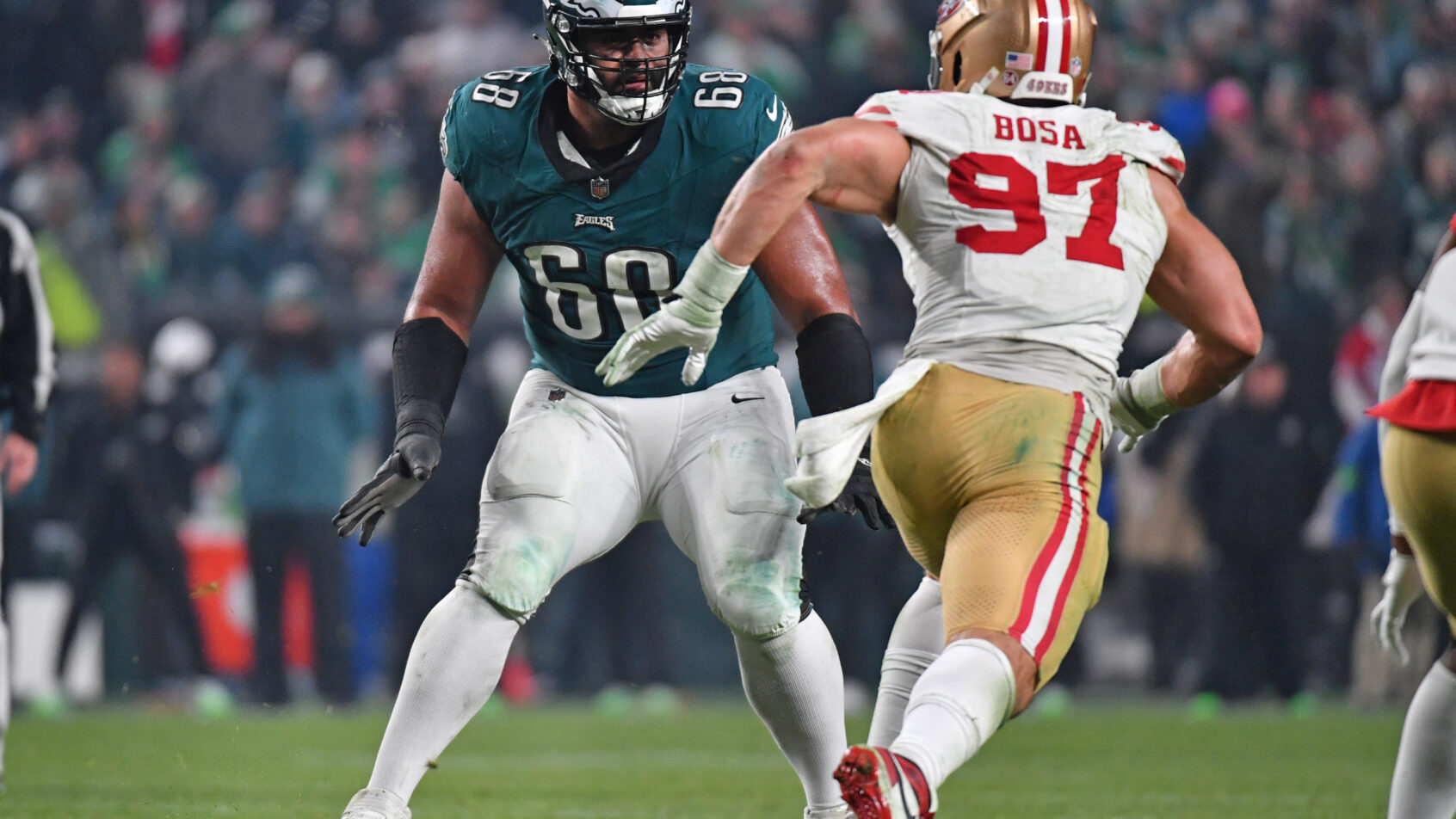 San Francisco 49ers defensive end Nick Bosa rushes the passer against Philadelphia Eagles offensive tackle Jordan Mailata