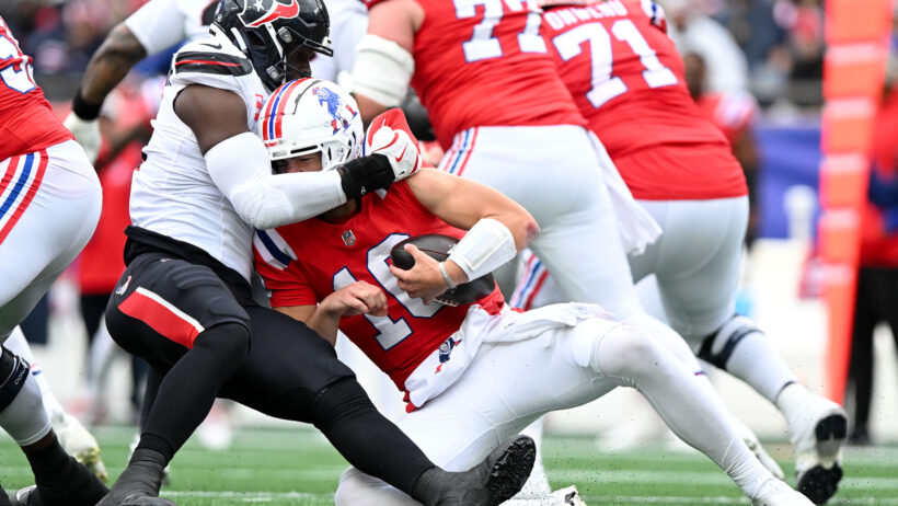 Houston Texans defensive end Will Anderson Jr sacks New England Patriots quarterback Drake Maye