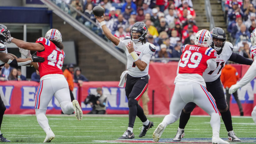 Houston Texans quarterback C.J. Stroud throwing a pass