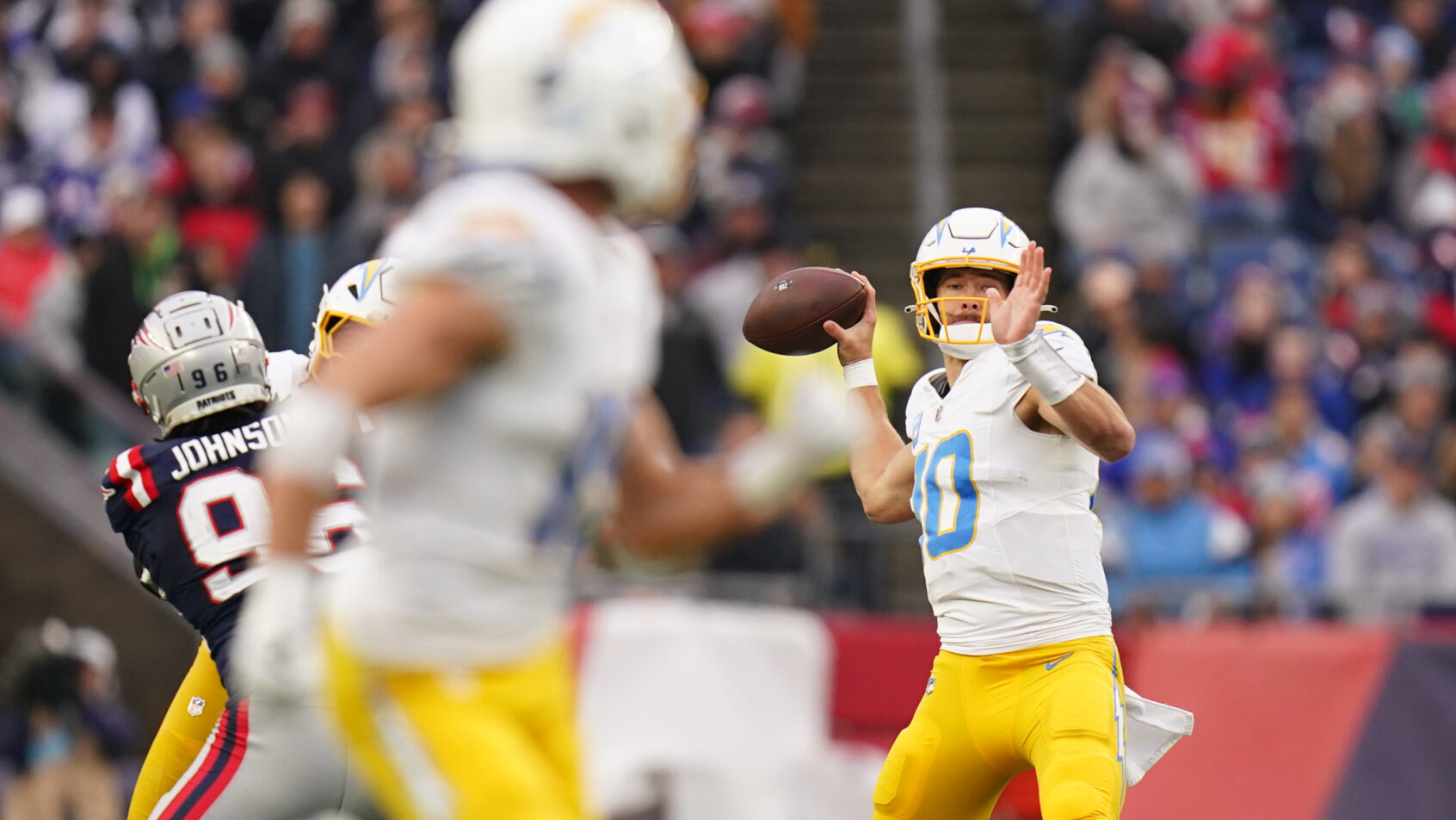 Los Angeles Chargers quarterback Justin Herbert throwing a pass