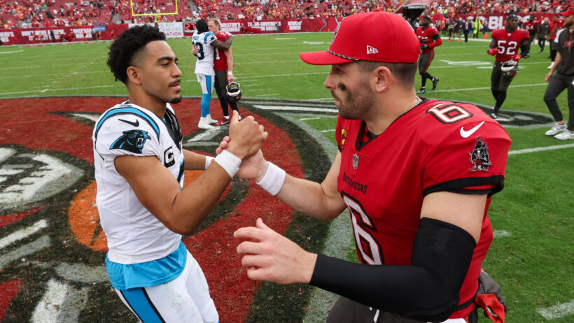 Bryce Young shakes hands with Baker Mayfield