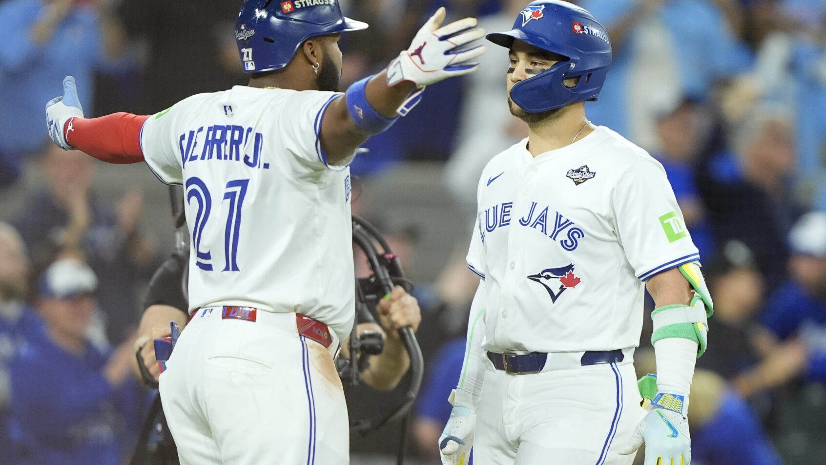 Toronto Blue Jays designated hitter Bo Bichette celebrates at home plate