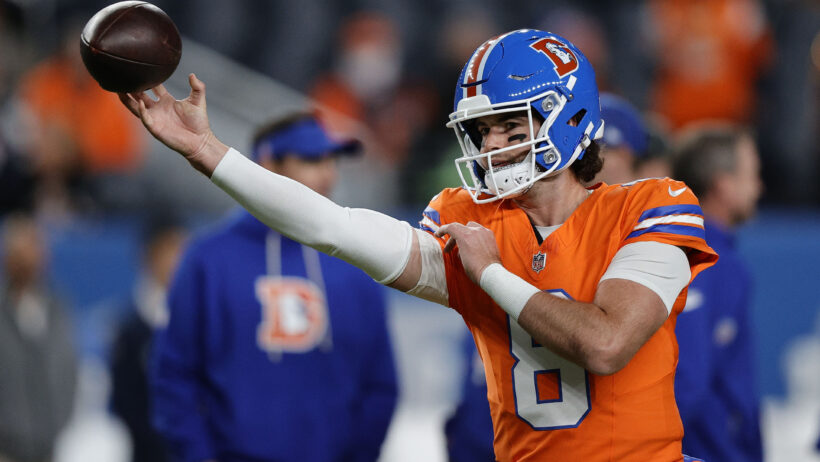 Jarrett Stidham throws a warmup pass for the Broncos.
