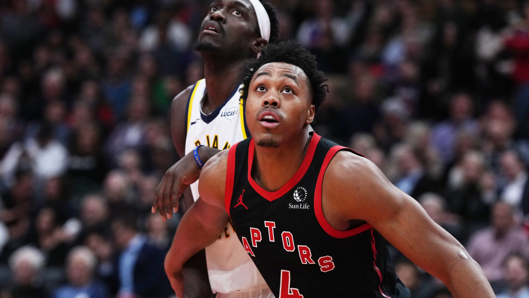 Indiana Pacers forward Pascal Siakam battling with Toronto Raptors forward Scottie Barnes