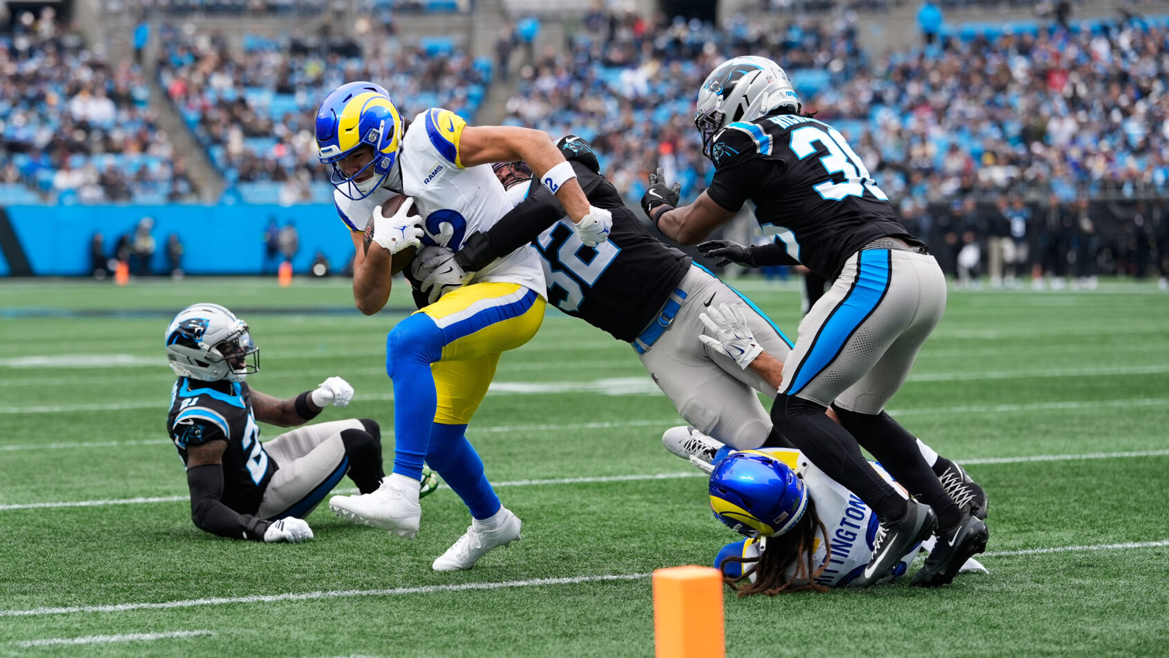 Los Angeles Rams wide receiver Puka Nacua runs with the ball