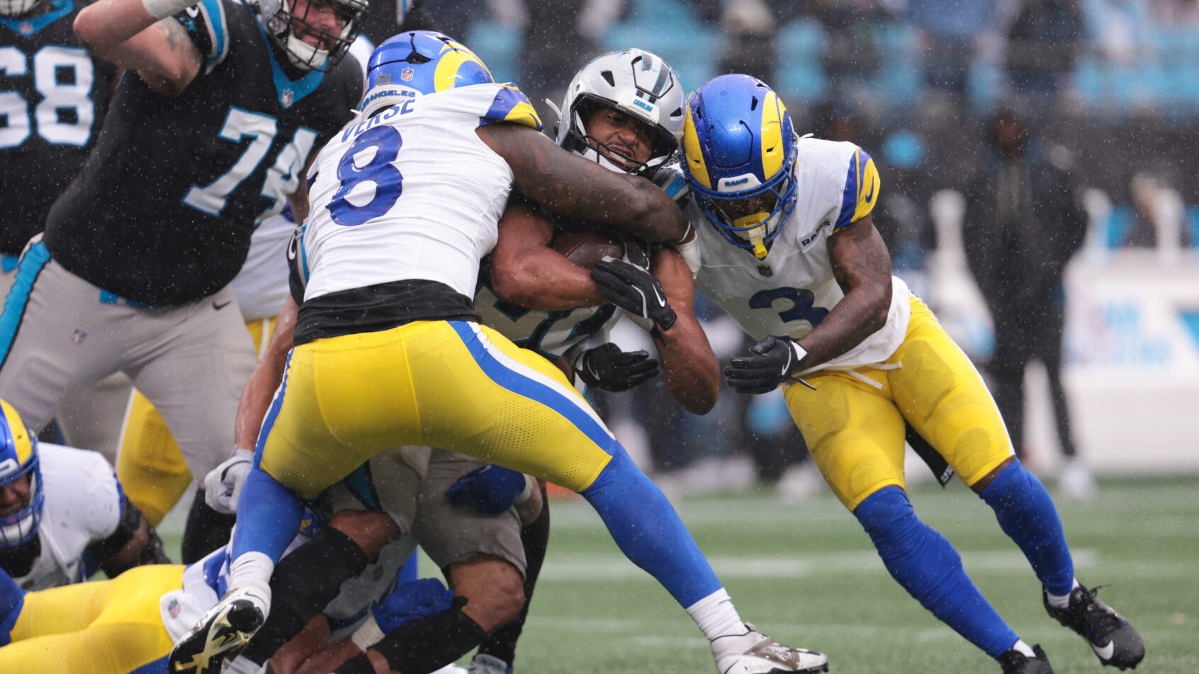 The Rams wrap up Chuba Hubbard in a matchup in Carolina.