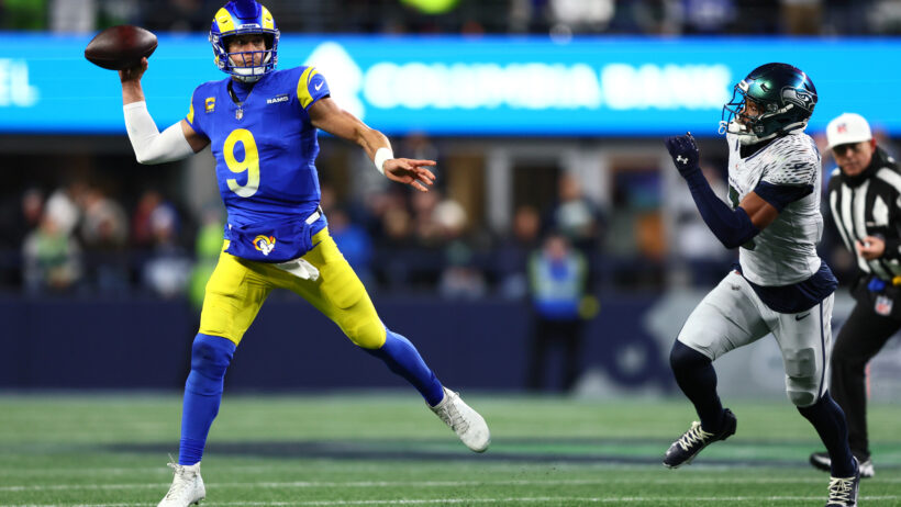 Matthew Stafford throwing on the run