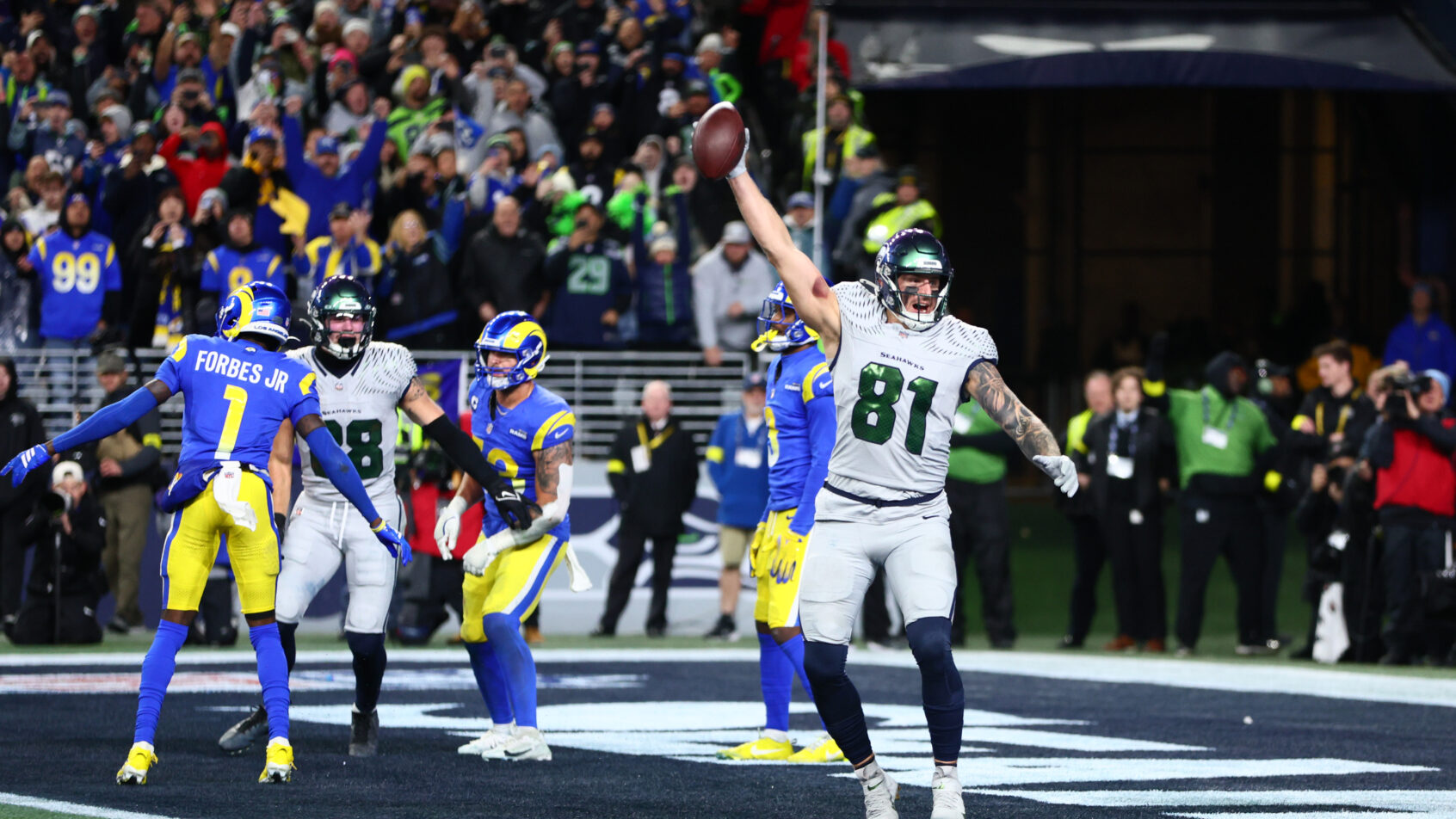 Seattle Seahawks tight end Eric Saubert celebrates a TD