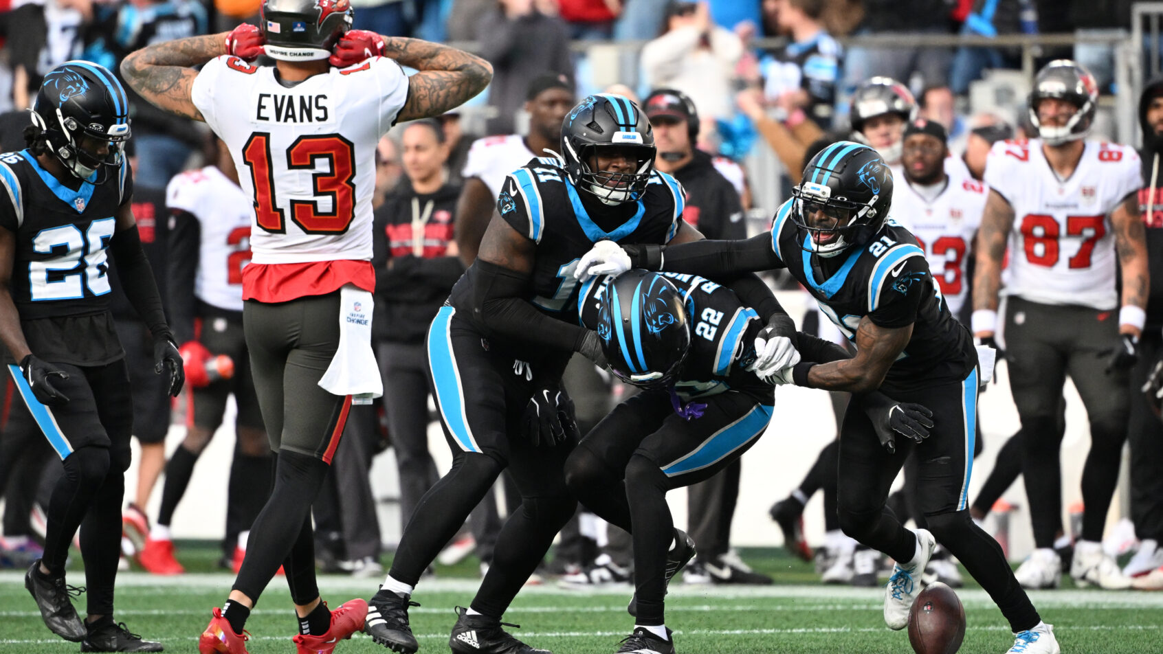 Mike Evans with his hands on his head