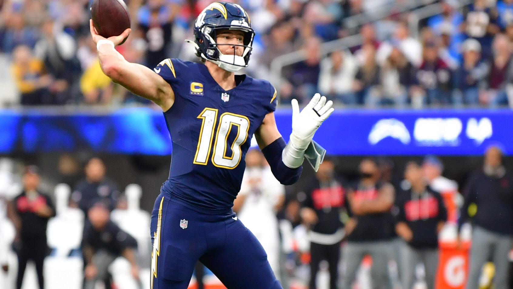 Justin Herbert fires a pass versus the Texans.
