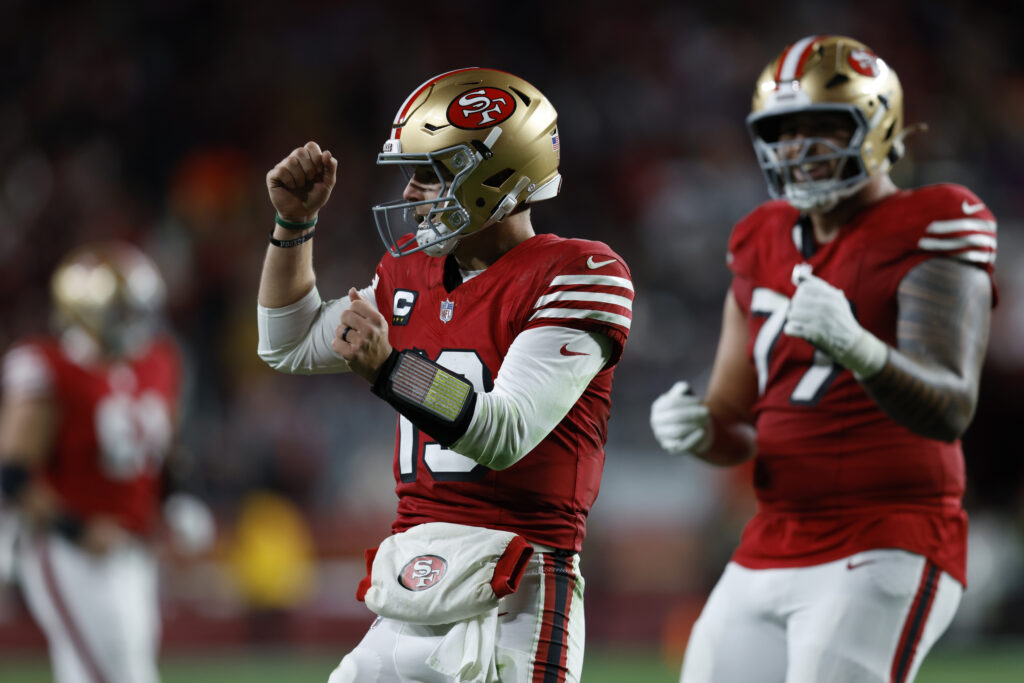 Brock Purdy celebrating and dancing after the play