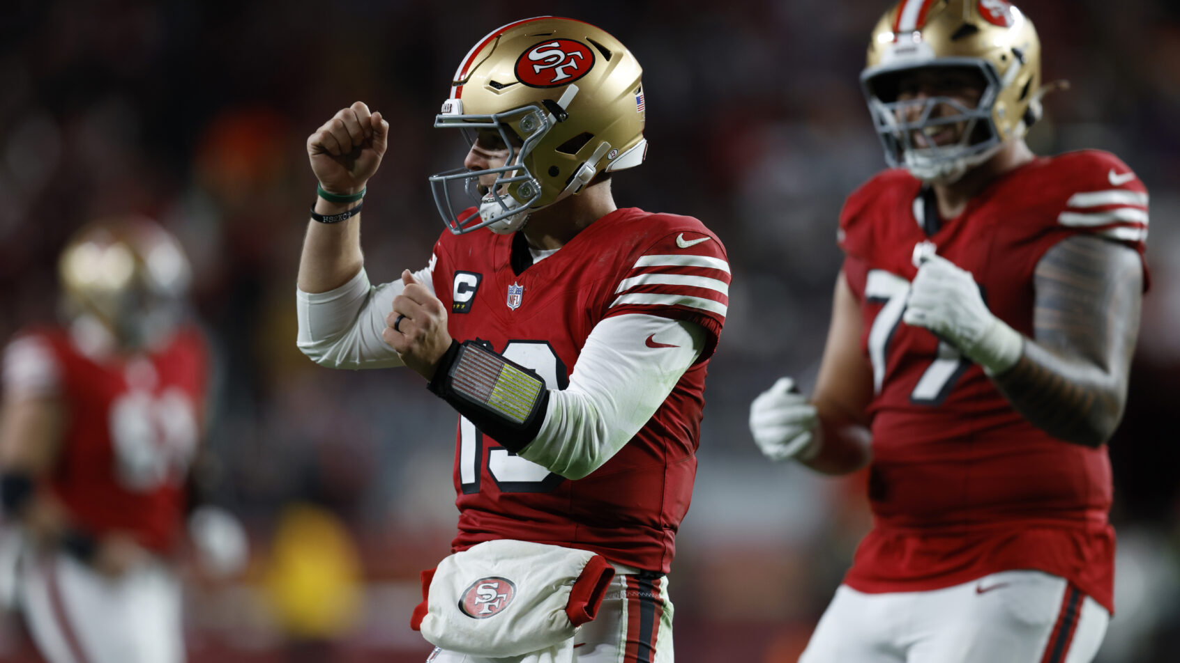 Brock Purdy celebrating and dancing after the play