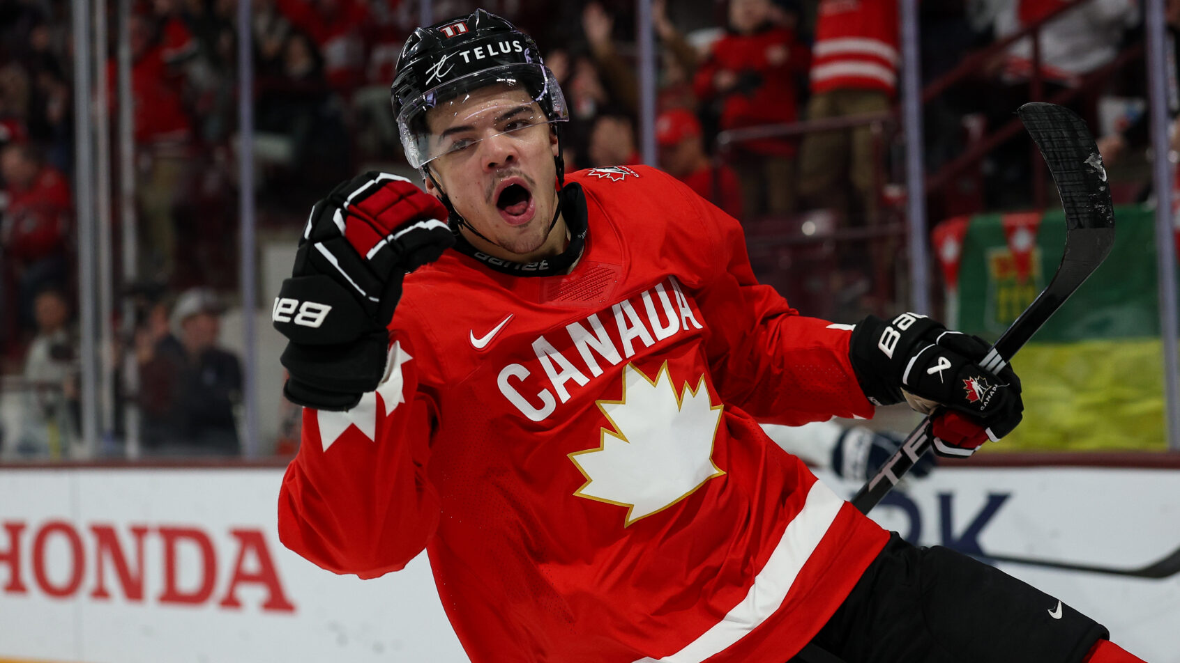 Tij Iginla celebrates a goal versus Finland at the World Juniors.