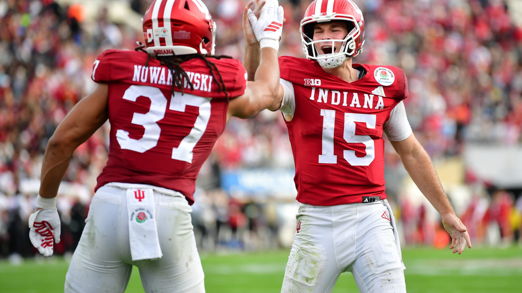 Fernando Mendoza celebrates with Riley Nowakowski