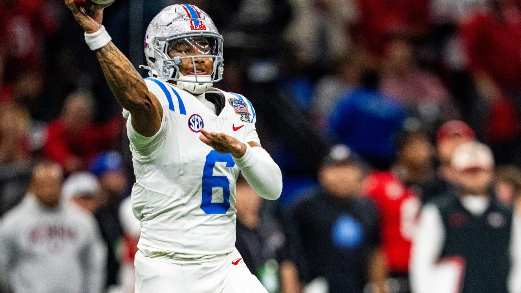 Trinidad Chambliss fires a pass versus Ohio State in the CFP quarterfinal.