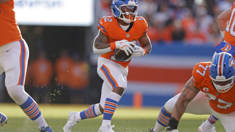 Denver Broncos running back RJ Harvey carrying the ball