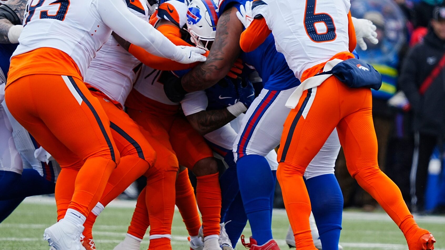 The Denver Broncos wrap up James Cook in a Wild Card Playoff game.