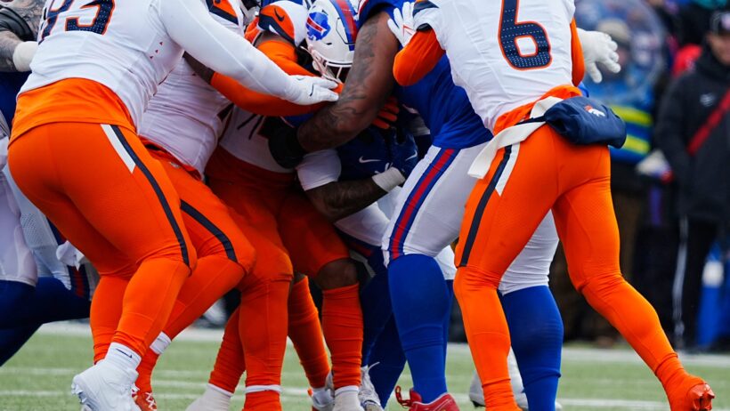 The Denver Broncos wrap up James Cook in a Wild Card Playoff game.
